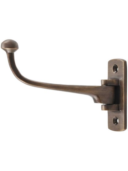 Ellis Solid-Brass Coat Hook in Antique Brass.
